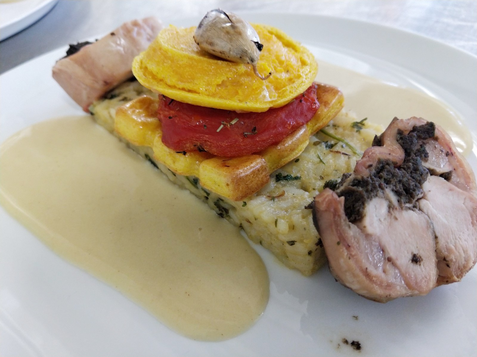 La recette du mois : selle d’agneau farcie, palets de courge et risotto